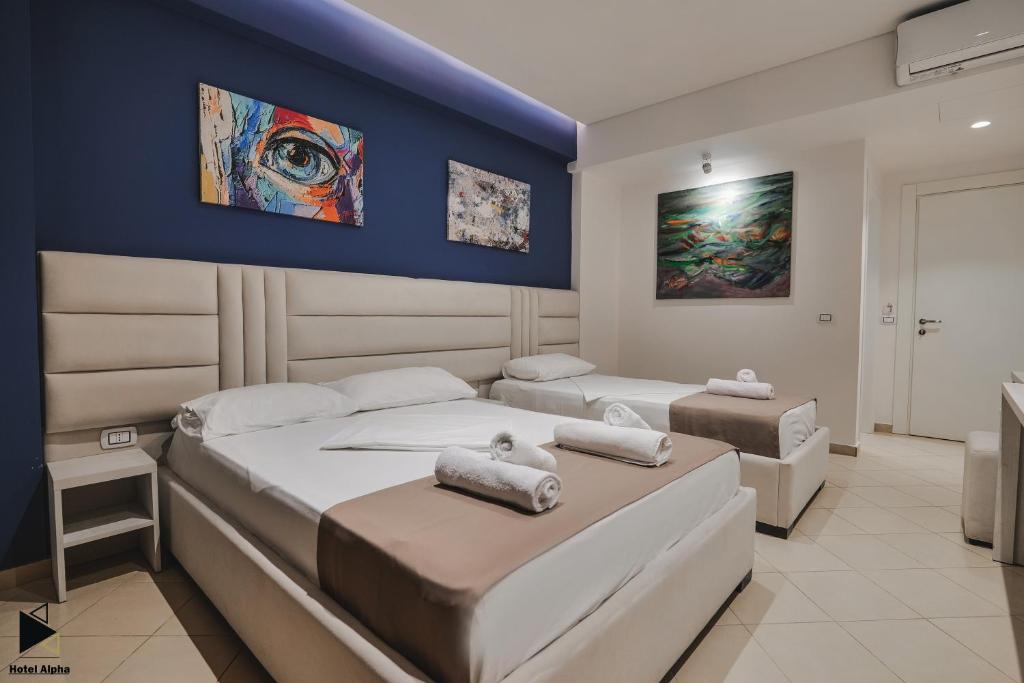 Triple Room with Balcony at Hotel Alpha